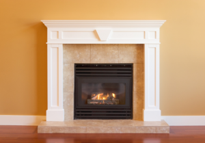 A fitted gas fireplace in a living room.
