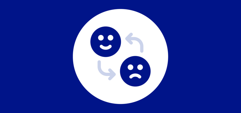 An icon depicting a happy face and a sad face.