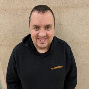Portrait image of Michael Howells, our Peer Navigator for Farnworth.