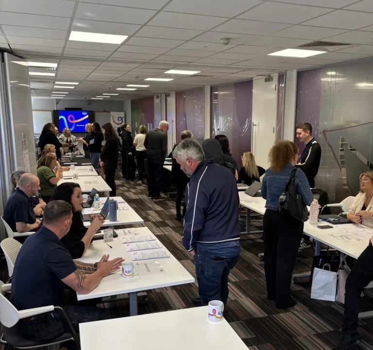 Colleagues and customers at our 20% Careers in Housing event on Wednesday 29 April. There are stalls where colleagues share details on different career paths within Be One Homes.