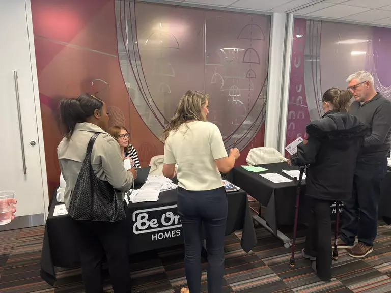 Colleagues and customers at our 20% Careers in Housing event on Wednesday 29 April. There are stalls where colleagues share details on different career paths within Be One Homes.