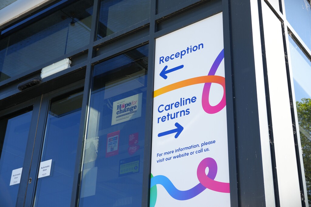 A close-up shot of the signage outside our new Careline control room based at our main Valley House office.