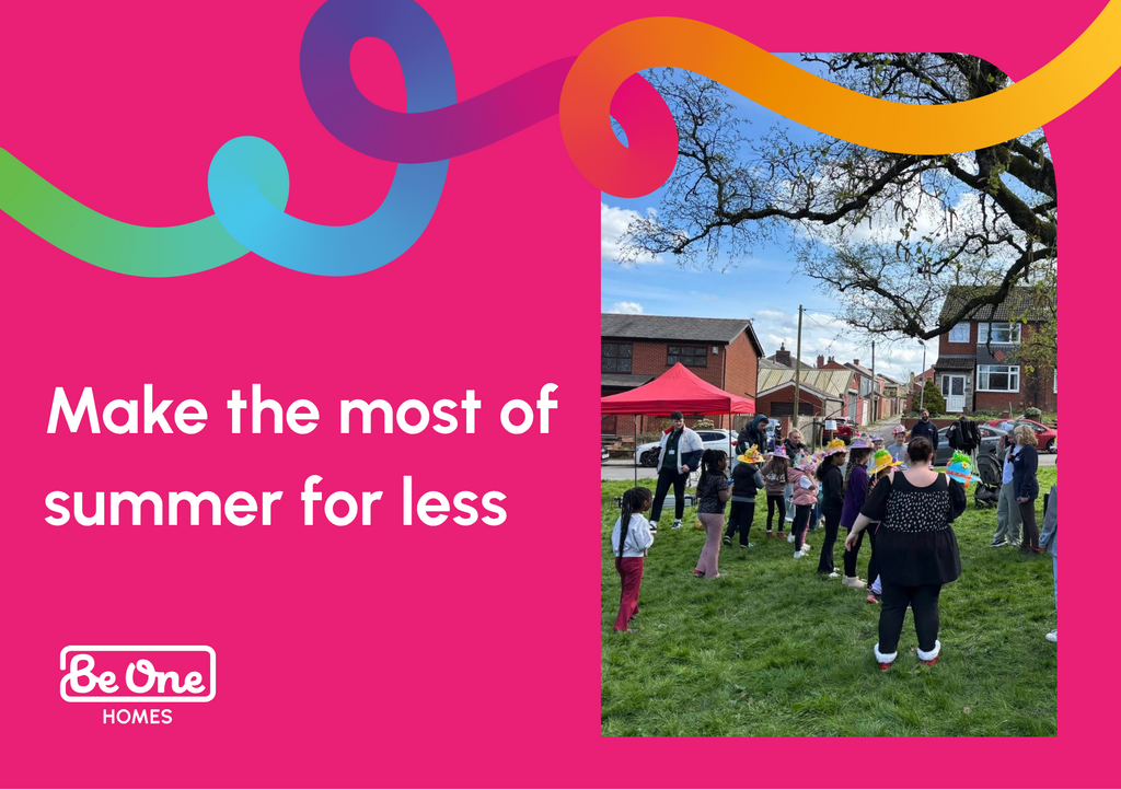 Graphic for Be One Homes with the headline “Make the most of summer for less” in large white text on a bright pink background. Colourful ribbon-like shapes decorate the top of the design. On the right, a photo shows a community event in a grassy outdoor area, with adults and children gathered together near a red gazebo, surrounded by residential houses and trees under a blue sky. The Be One Homes logo appears in the bottom-left corner.